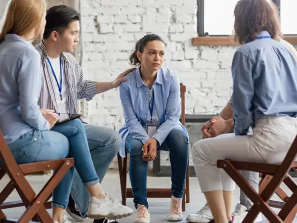 Peer support recovery meeting demonstrating 12-step methodology effectiveness at PorchLight Recovery in Lancaster Pennsylvania