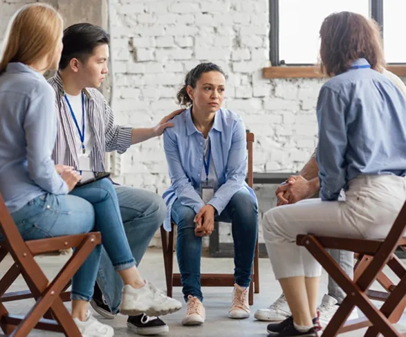 Peer support recovery meeting demonstrating 12-step methodology effectiveness at PorchLight Recovery in Lancaster Pennsylvania