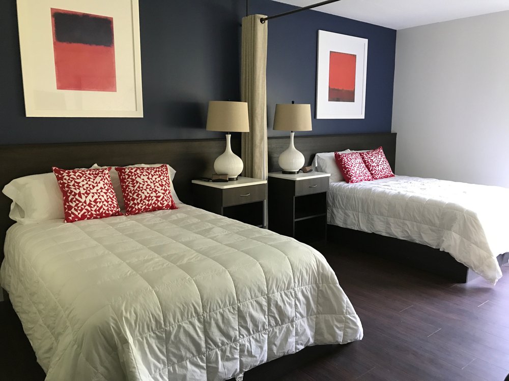 Recovery Centers of America at Devon PA residential bedroom for inpatient addiction treatment